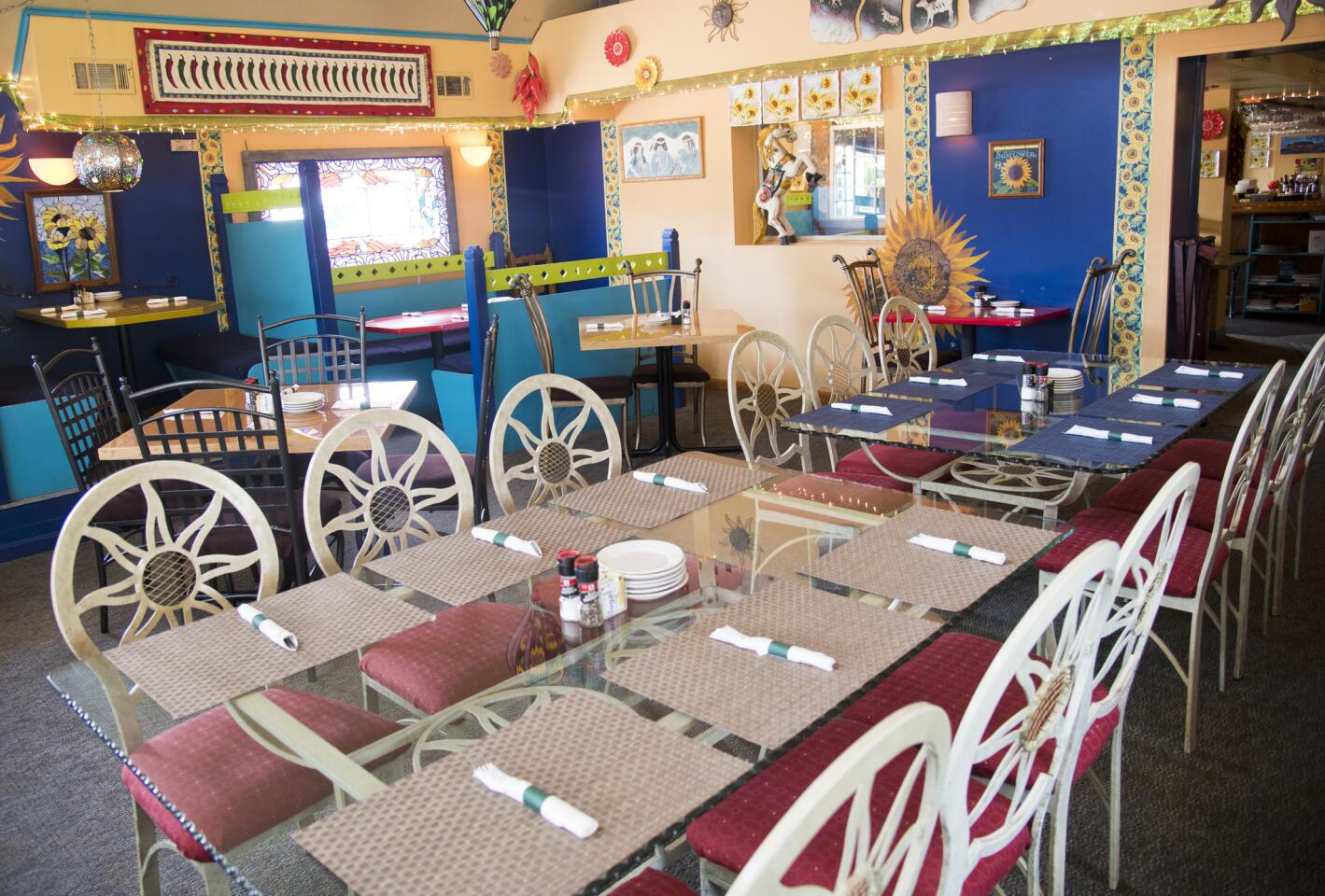 The dining area is colorfully decorated at Lista's Grill in Pasadena.