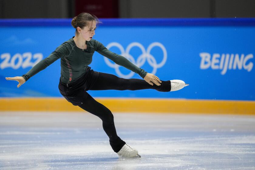 Kamila Valieva, of the Russian Olympic Committee, trains at the 2022 Winter Olympics.
