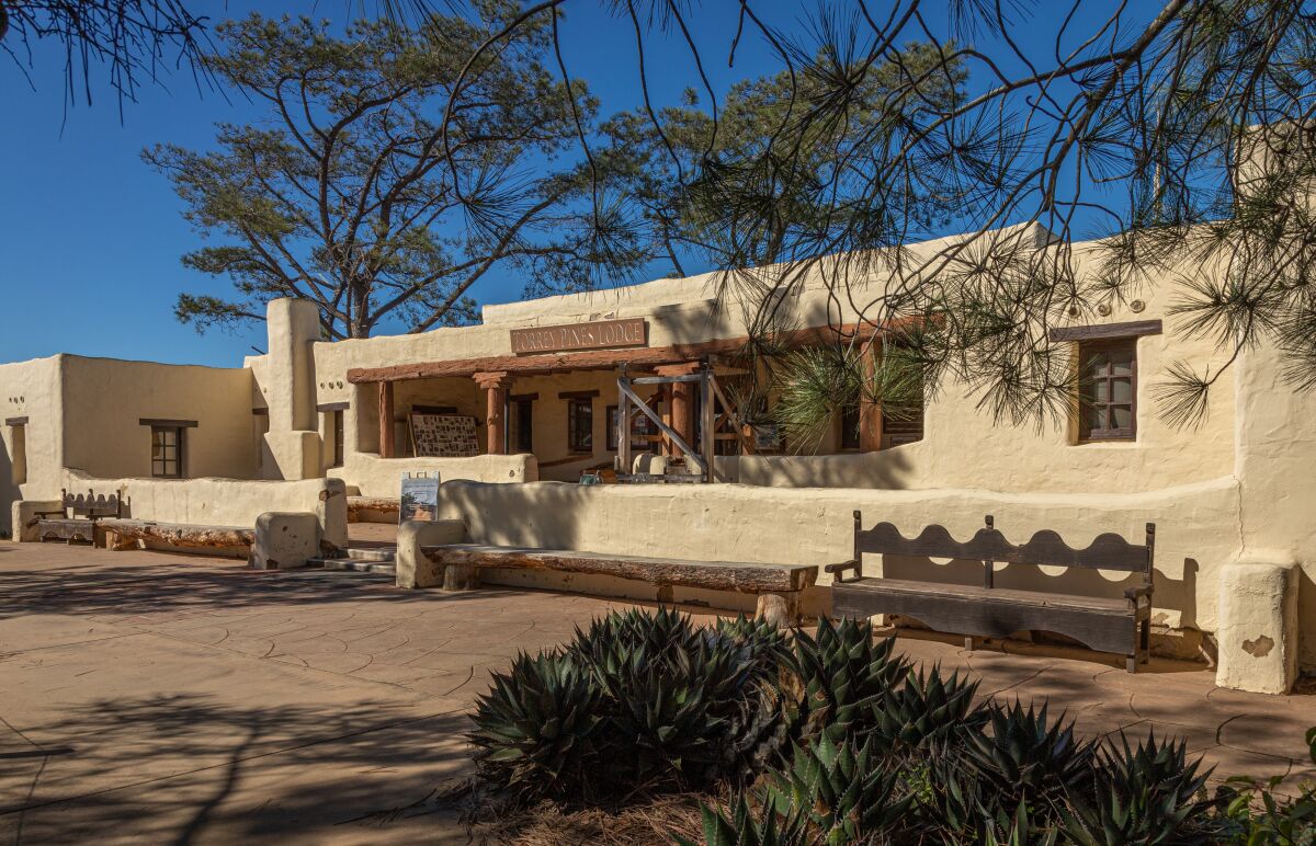 The adobe visitor center, also known as The Lodge, was built as a restaurant in 1923 by Ellen Browning Scripps.