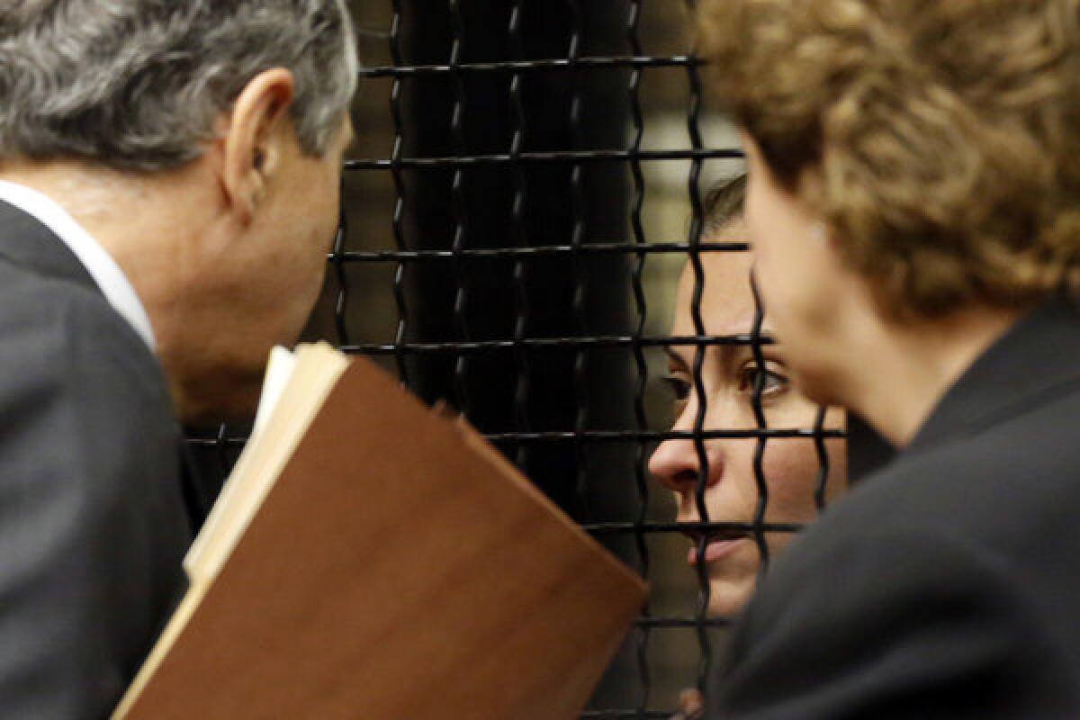 Saudi princess Meshael Alayban listens to her attorneys Paul Meyer, left, and Jennifer Keller during an appearance in court Thursday.