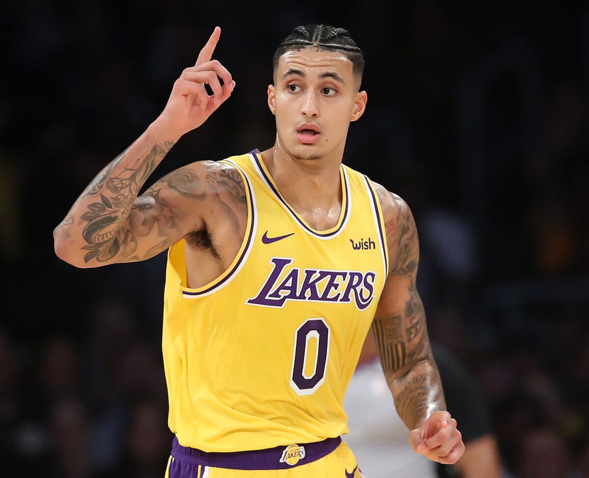 Kyle Kuzma of the Lakers reacts after making a three-point shot. 