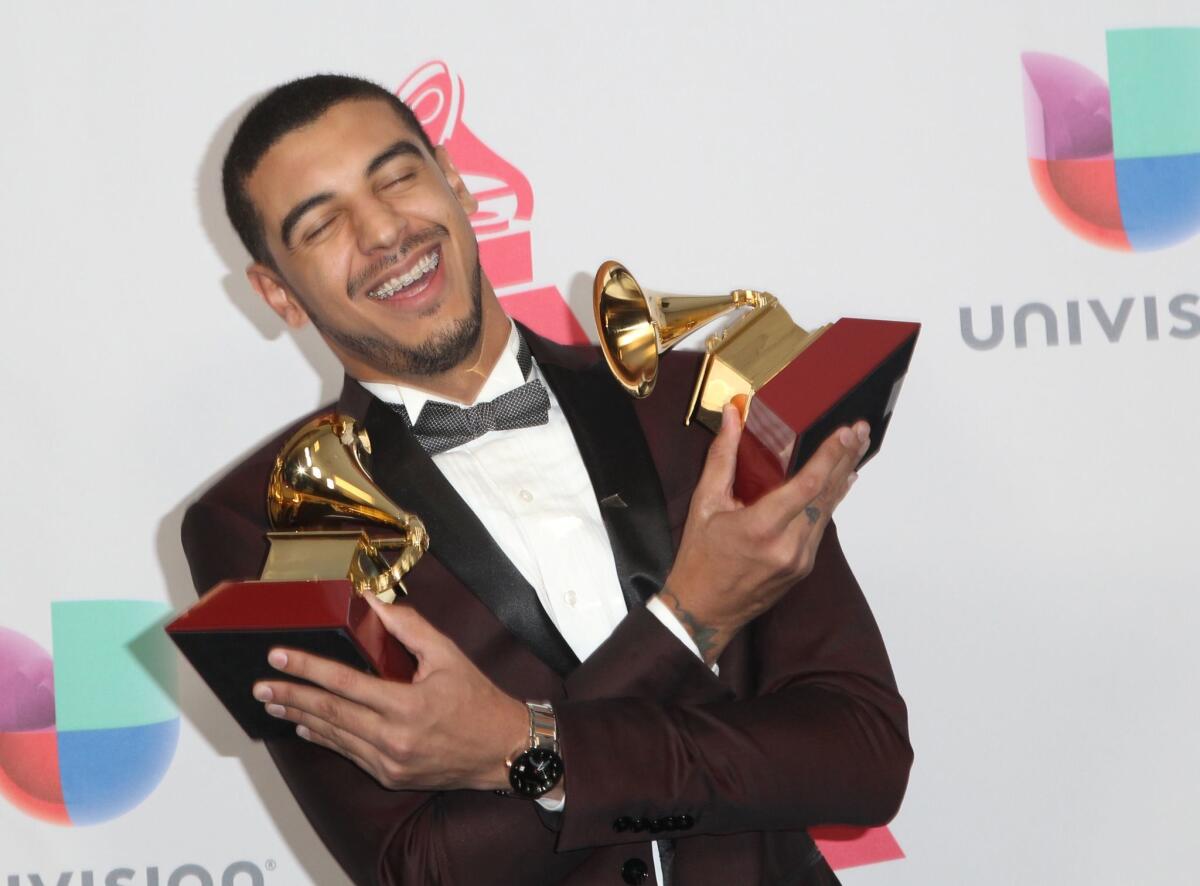 Manuel Medrano poses with his Grammys for Best New Artist and Best Singer-Songwriter Album during the 17th Annual Latin Grammy Awards on November 17, 2016, in Las Vegas, Nevada. / AFP PHOTO / Tommaso BoddiTOMMASO BODDI/AFP/Getty Images ** OUTS - ELSENT, FPG, CM - OUTS * NM, PH, VA if sourced by CT, LA or MoD **