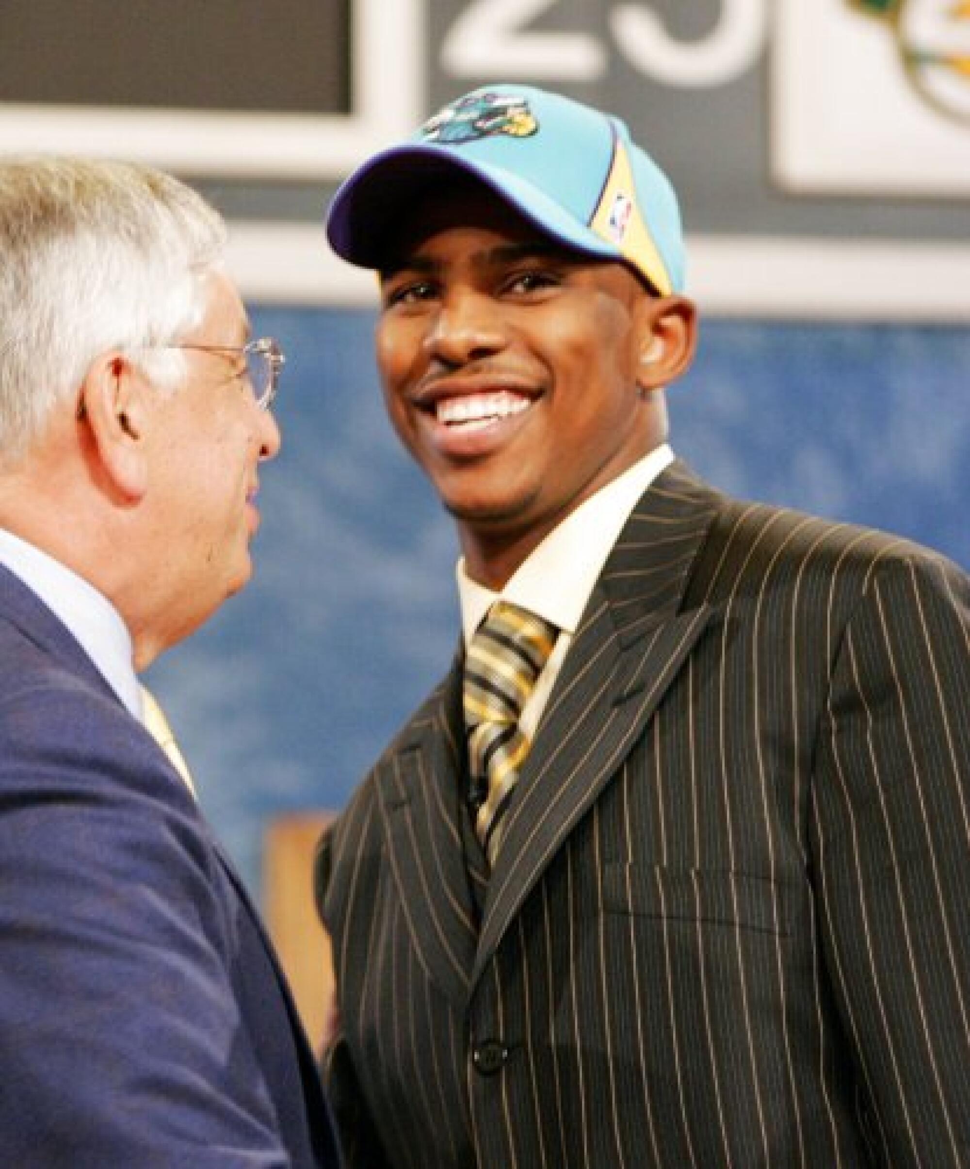 Chris Paul is congratulated by commissioner David Stern after he was selected in the first round of the 2005 NBA draft.