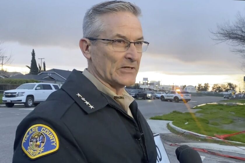 FILE - In this frame grab from video provided by the Tulare Count Sheriff's Office, Sheriff Mike Boudreaux speaks to the media near the scene of a fatal shooting in Visalia, Calif., on Jan. 16, 2023. Boudreaux said Friday, Feb. 3, 2023, that two gang members suspected in the massacre of six people last month in central California have been arrested, one after a gunbattle.(Tulare County Sheriff's Office via AP, File)