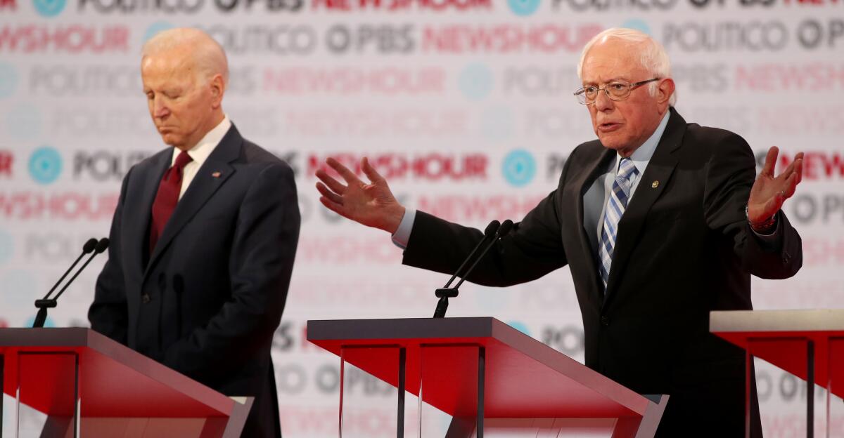 Joe Biden and Bernie Sanders during a debate in Los Angeles in December.