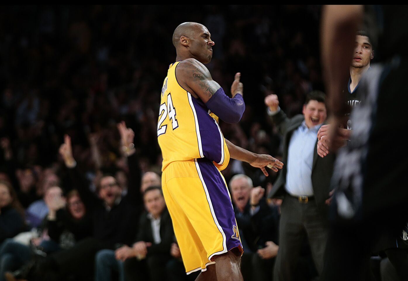 A determined Kobe Bryant pounds his chest after hitting a three-pointer against the Timberwolves late in the second quarter of a game at Staples Center on Feb. 2.