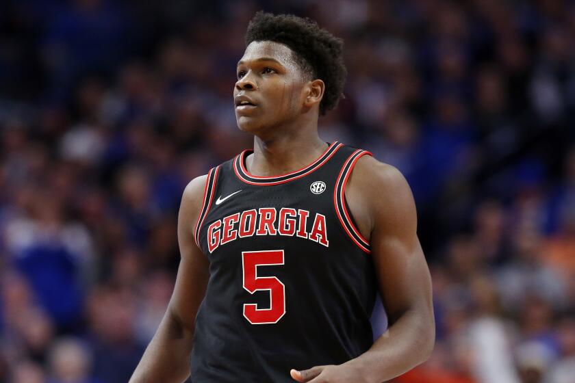 Georgia's Anthony Edwards (5) catches his breath during an NCAA college basketball game against Kentucky.