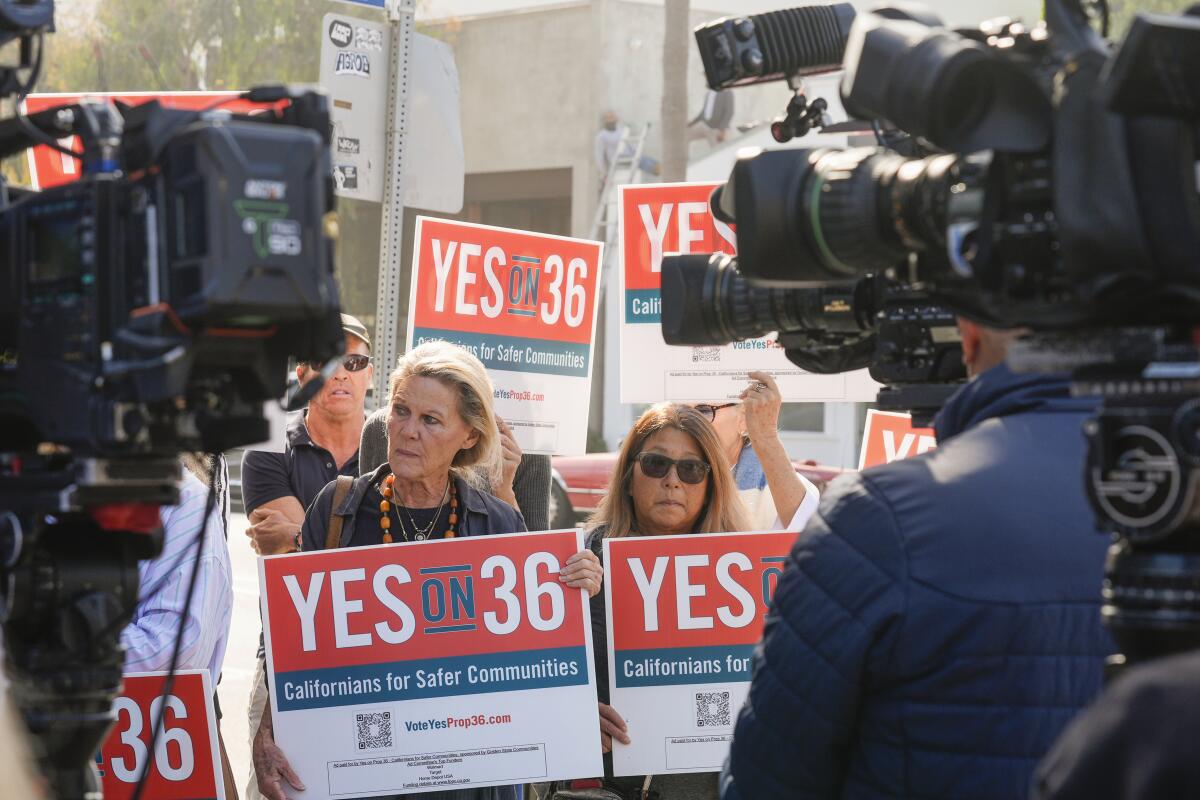 Supporters of Proposition 36 hold a news conference in Venice on Sept. 30. 