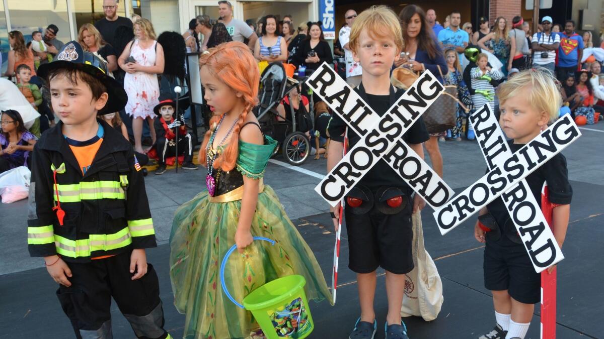 Kids paraded in their costumes during the Huntington Beach Halloween Fest held every year by the Huntington Beach Downtown Business Improvement District.