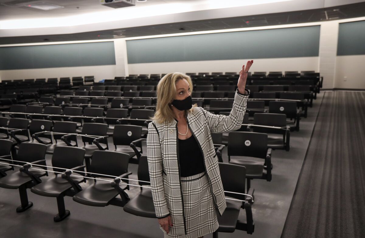Harris County District Clerk Marilyn Burgess talks about new technology used in an updated jury assembly room Friday, Feb. 4, 2022, at the Harris County jury assembly building in Houston. Efforts to reduce a backlog of tens of thousands of cases in Texas’ busiest court system got a boost Monday, Feb. 7, 2022, with the reopening of the newly restored building for jury selection. (Jon Shapley/Houston Chronicle via AP)