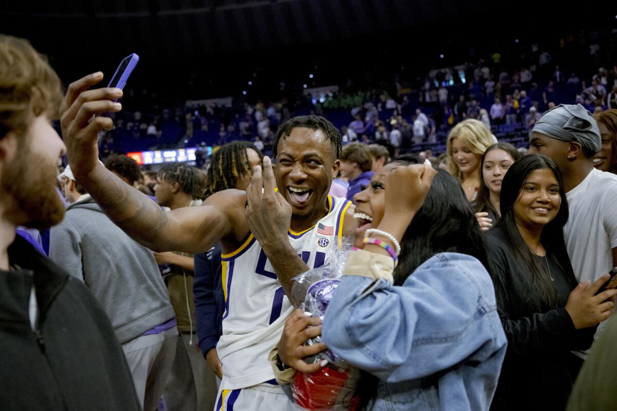 After beating Kentucky in basketball, LSU was fined $100,000 for court-scratching.