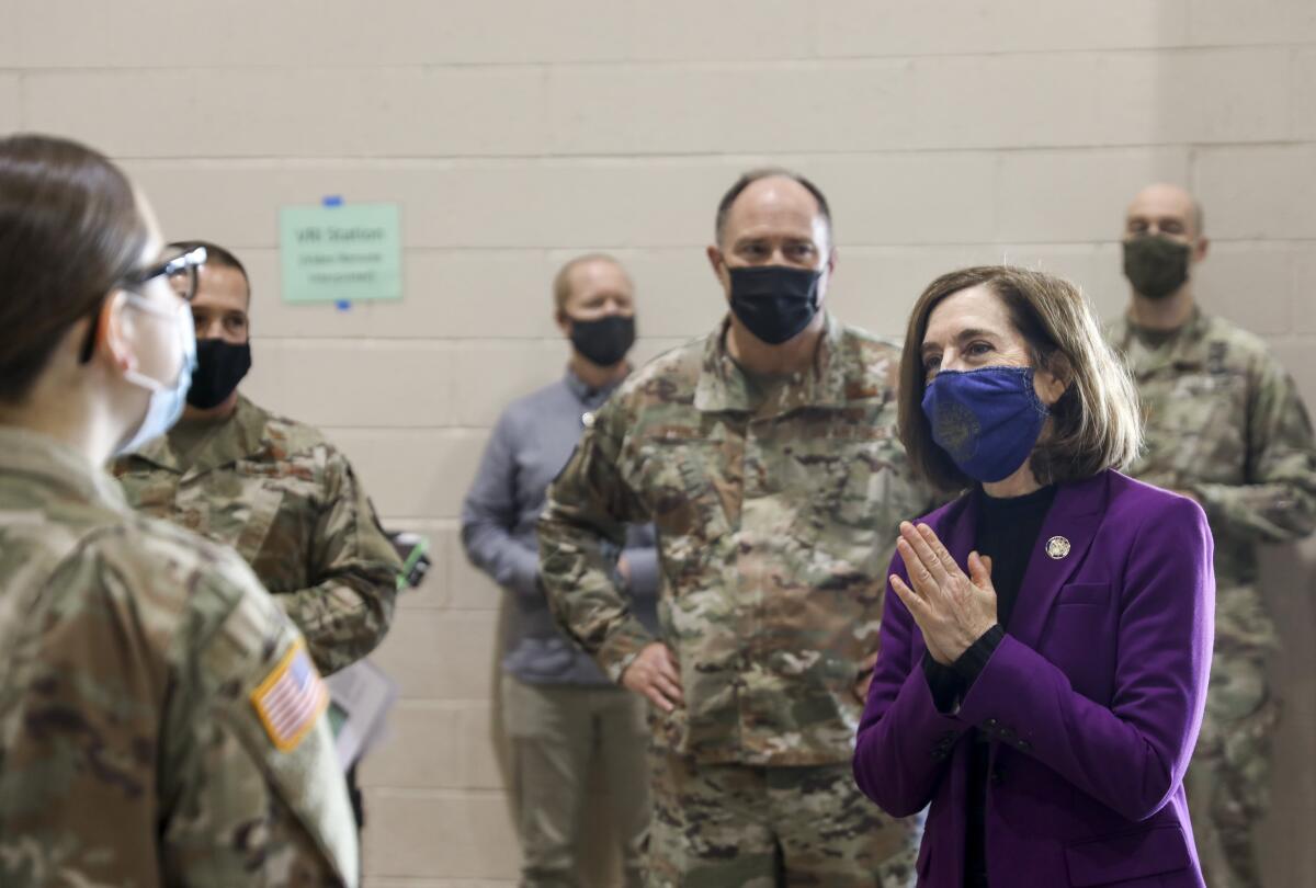 Oregon Gov. Kate Brown meets with National Guard troops 