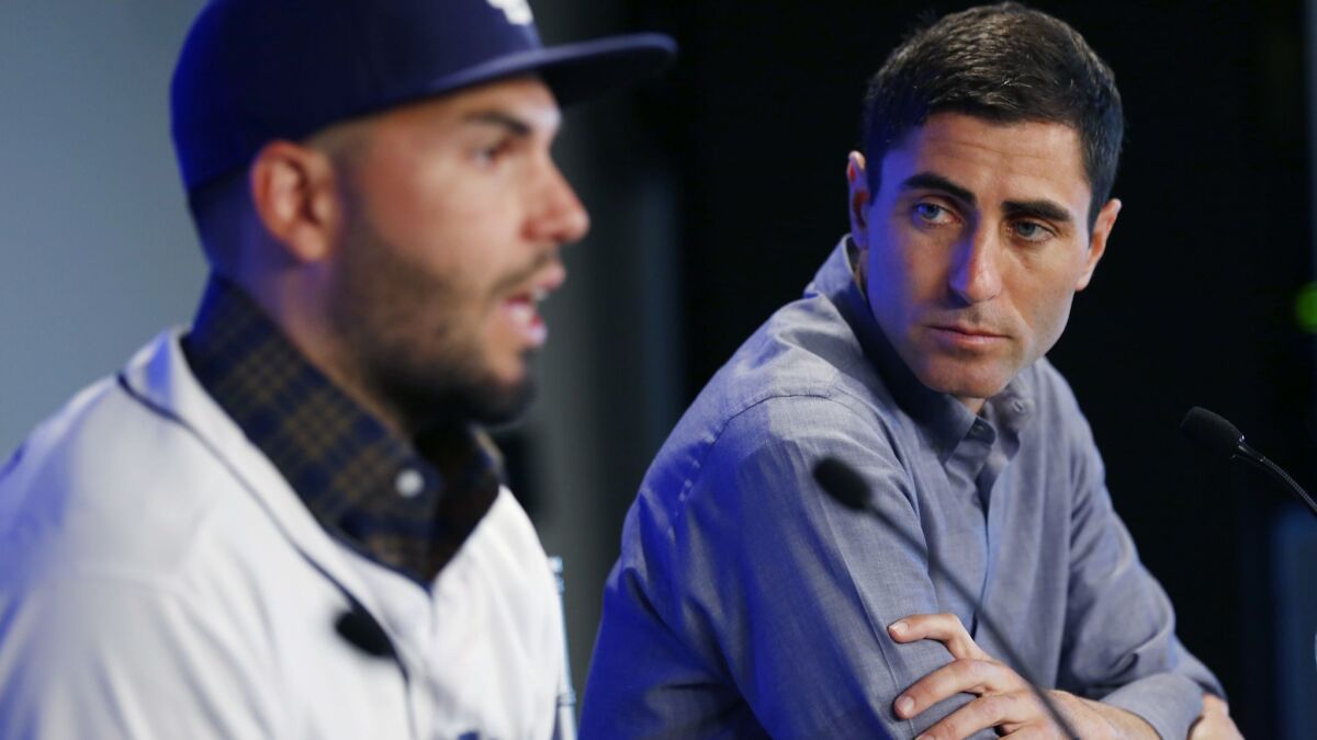The San Diego Padres welcomed Eric Hosmer at a news conference, shown here with general manager A.J. Preller in Peoria on Feb. 20, 2018.