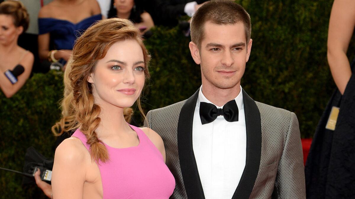 Emma Stone and Andrew Garfield attend a Costume Institute gala at the Metropolitan Museum of Art in New York on May 5, 2014.