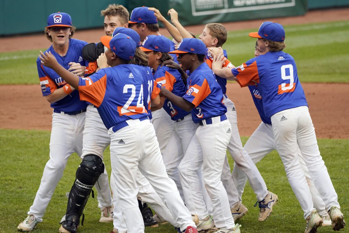 Taylor, Mich. players celebrate their win over Hamilton, Ohio, in the Little League World Series Championship.