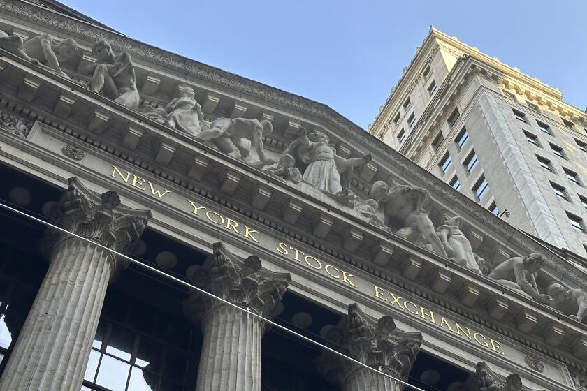 FILE - The New York Stock Exchange is shown on May 21, 2024, in New York. World stocks are mostly lower on Monday, June 10, 2024, after a U.S. jobs report released Friday was hotter than expected. (AP Photo/Peter Morgan, File)