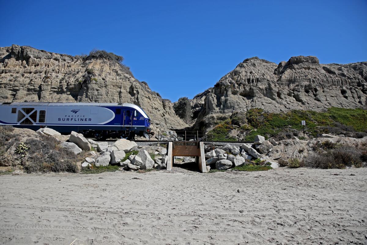 An Amtrak train passes a seaside area of San Clemente 