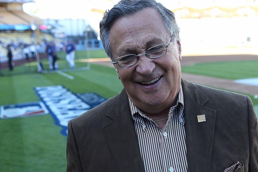 Long time Dodgers announcer Jaime Jarrin on the field before Game 4 of the 2013 National League Division Series at Dodger Stadium.