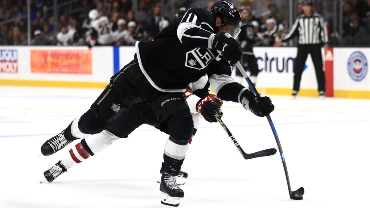 The Kings' Anze Kopitar shoots the puck during the second period of a preseason game against the Arizona Coyotes at Staples Center on Sept. 18.