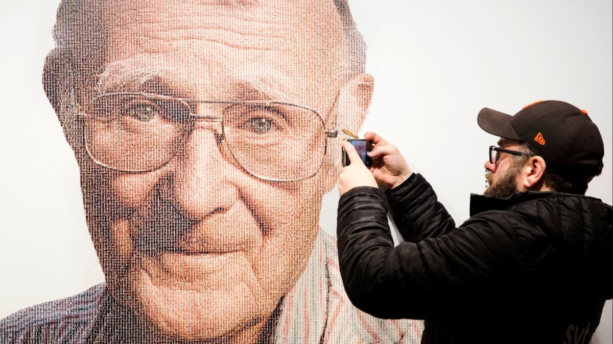 A visitor takes a photo of founder of Swedish multinational furniture retailer IKEA, Ingvar Kamprad, at the IKEA museum, in Almhult, Sweden, on Sunday. Kamprad died Saturday.