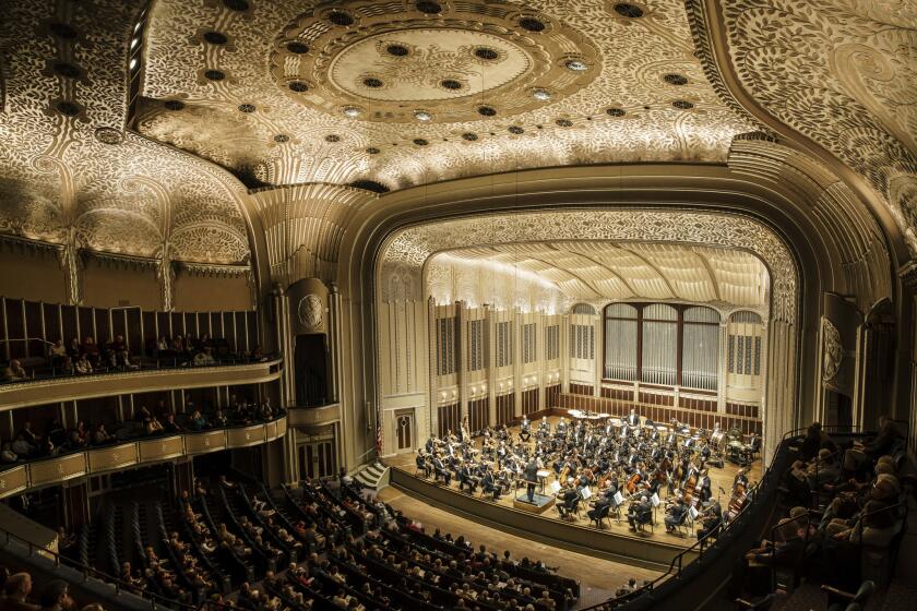 Severance Hall's design bears the influence of philanthropists John and Elisabeth Severance. The lace-like leaf pattern on the ceiling is said to match her wedding dress.