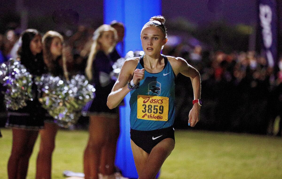 Corona Santiago's Rylee Blade competes in the girls' sweepstakes race at the Woodbridge Cross Country Classic.