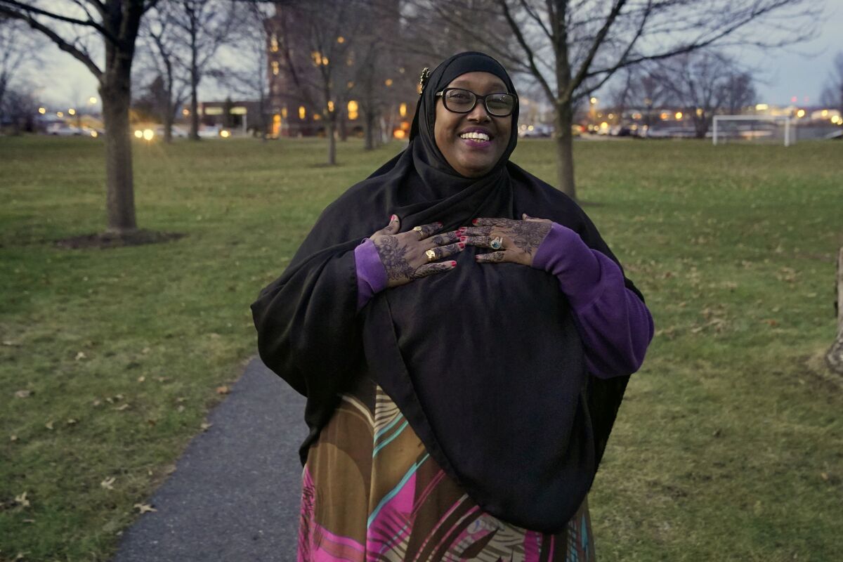 Deqa Dhalac poses near her home Tuesday, Dec. 7, 2021, in South Portland, Maine. On Monday Dhalac, who fled Mogadishu 31 years ago, became the first Somali-American mayor in the United States. (AP Photo/Robert F. Bukaty)