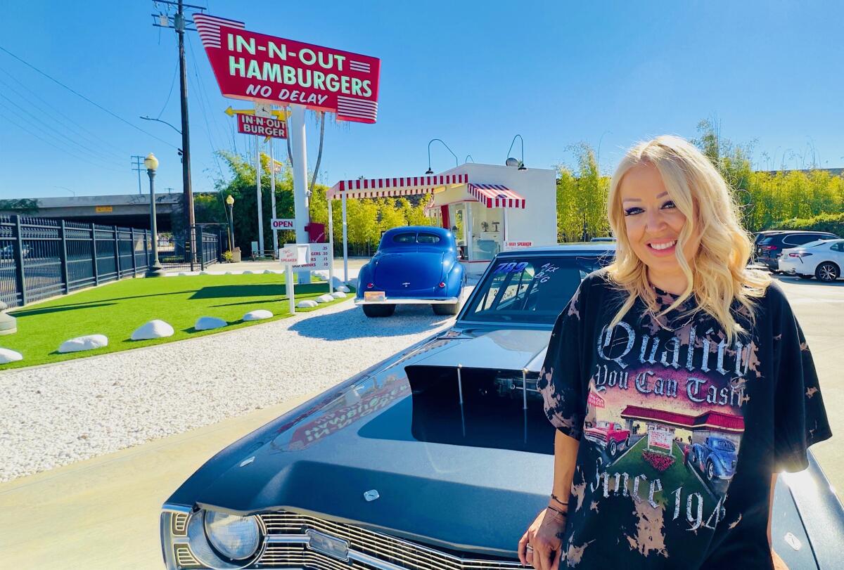 In-N-Out owner and CEO Lynsi Snyder visits a replica of the first In-N-Out hamburger stand in Baldwin Park.