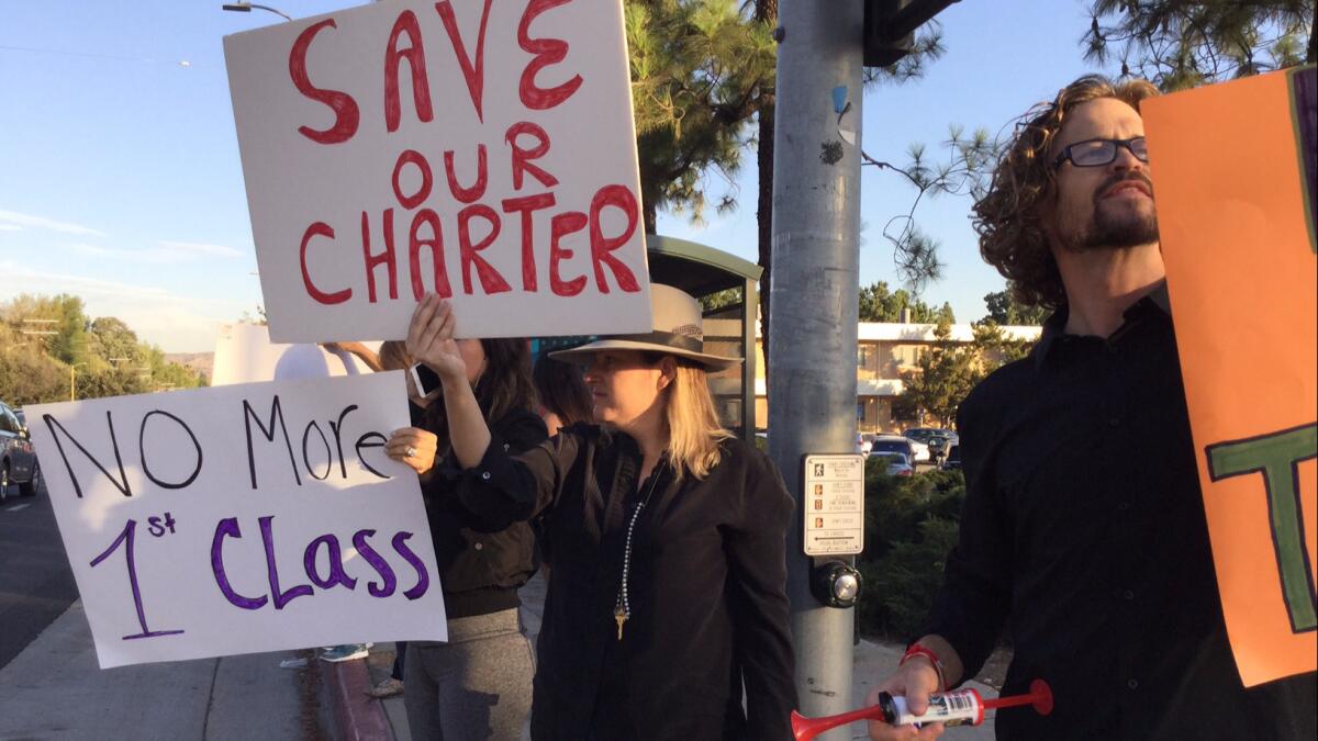 Teachers and their supporters staged a protest Wednesday at El Camino Real Charter High School, calling for changes in senior management.