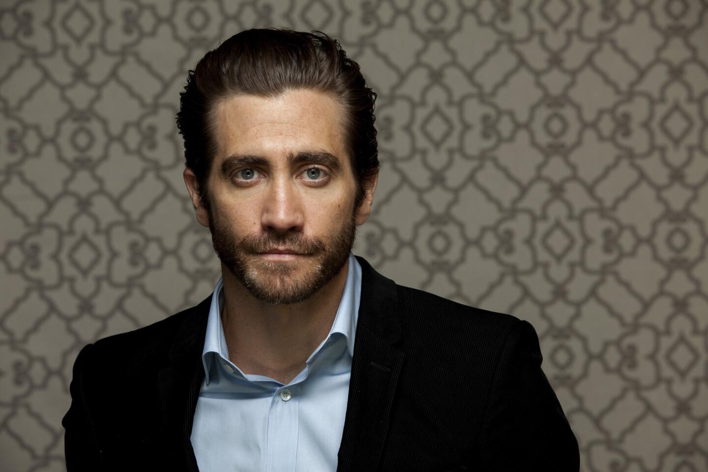 Jake Gyllenhaal was born into Hollywood royalty. Jamie Lee Curtis is his godmother, Paul Newman is his godfather, his father is a director and his mother a producer-screenwriter. When he was 11, Gyllenhaal made his big-screen debut in "City Slickers." Here is a look at his career since then.
