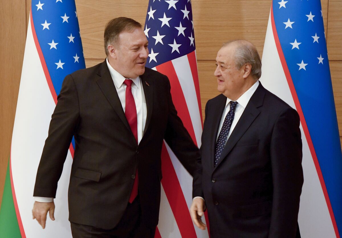 U.S. Secretary of State Mike Pompeo, left, and Uzbekistanís Foreign Minister Abdulaziz Kamilov meet in Tashkent, Uzbekistan, Monday, Feb. 3, 2020. (AP Photo)
