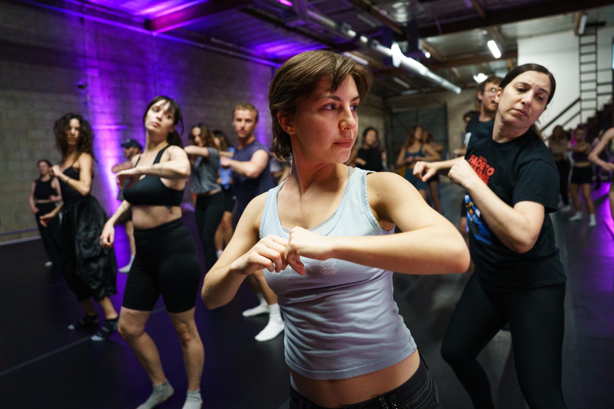 Attendees learning choreography.