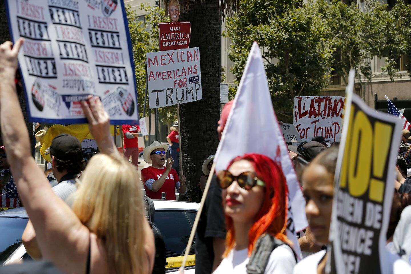 Trump supporters and protesters cross paths near LAPD headquarters in downtown L.A.