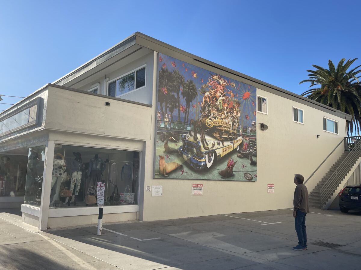 The mural "Hedonic Treadmill" is installed at 1162 Prospect St. in La Jolla.