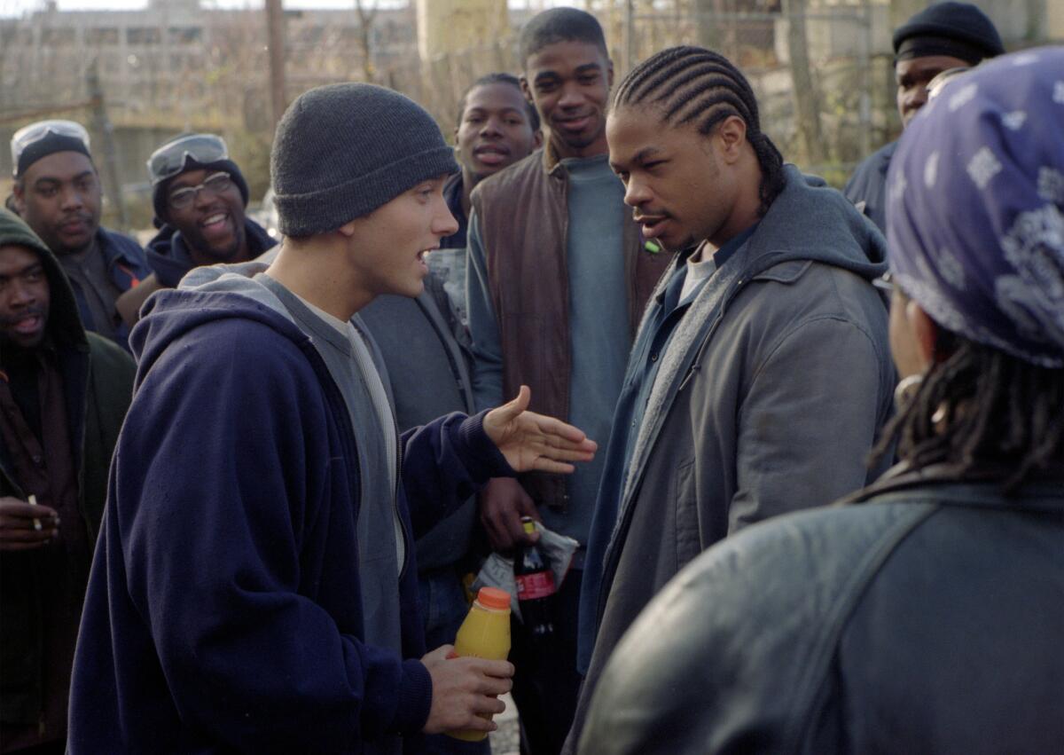 Jimmy (Eminem) confronts a co–worker (Xzibit) with a rap to defuse a volatile situation in the movie "8 Mile."