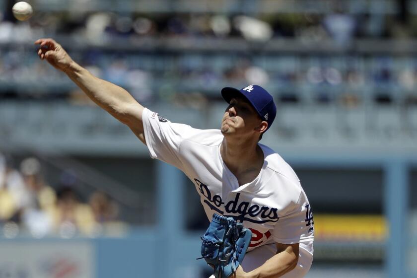 Los Angeles Dodgers starting pitcher Walker Buehler throws to the Cincinnati Reds during the second inning of a baseball game Wednesday, April 17, 2019, in Los Angeles. (AP Photo/Marcio Jose Sanchez)