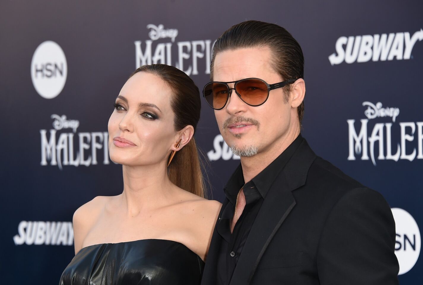 Angelina Jolie and Brad Pitt attend the world premiere of Disney's "Maleficent" at the El Capitan Theatre on May 28, 2014, in Hollywood.