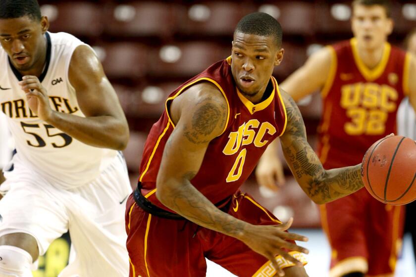 USC forward Darion Clark brings the ball up court in transition against Drexel on Friday in the Charleston Classic.