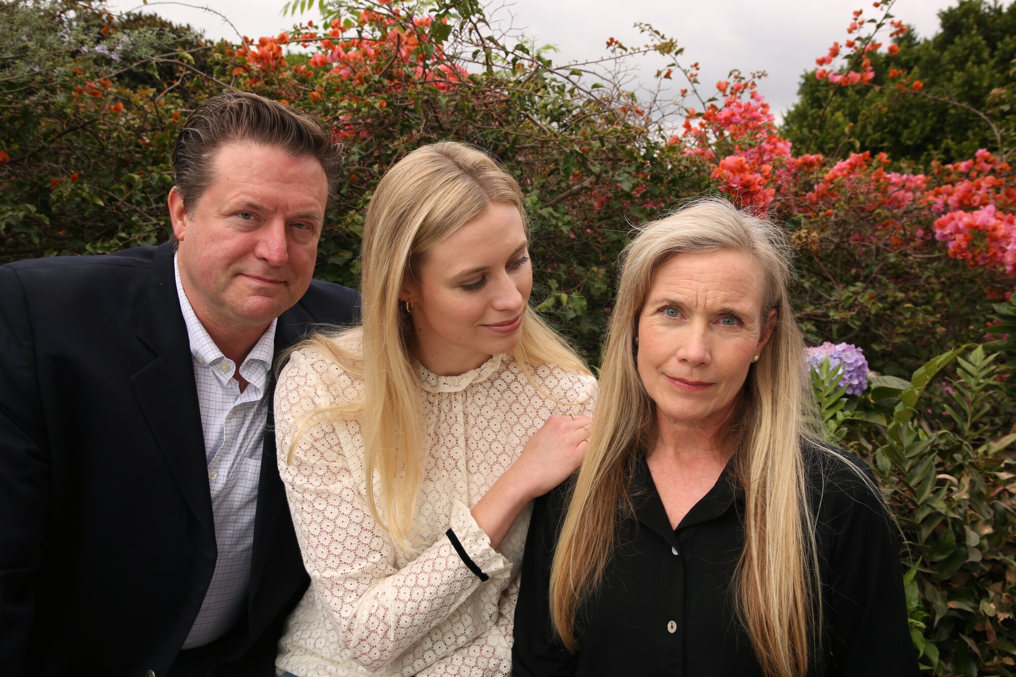 Hayley Hodson, center with her parents, Jimmy, and Sonya.