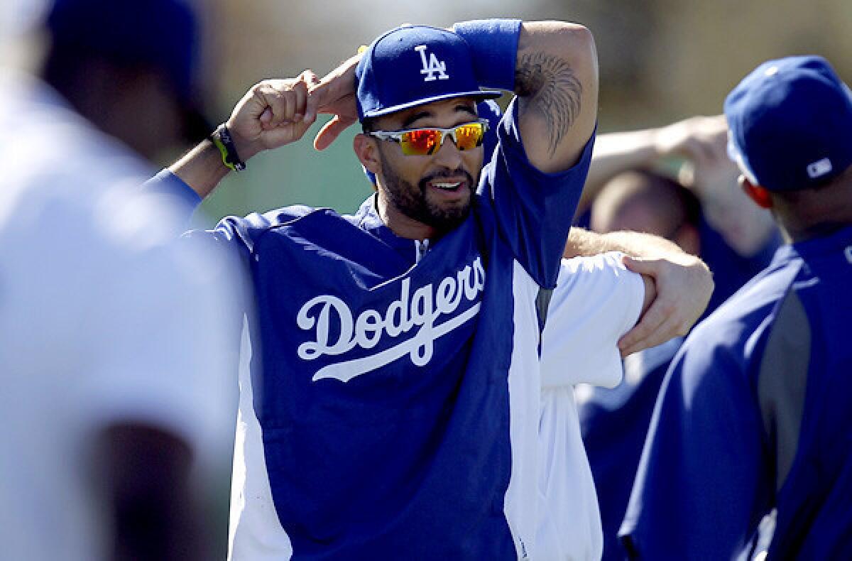 Dodgers' Hanley Ramirez arrives at camp healthy