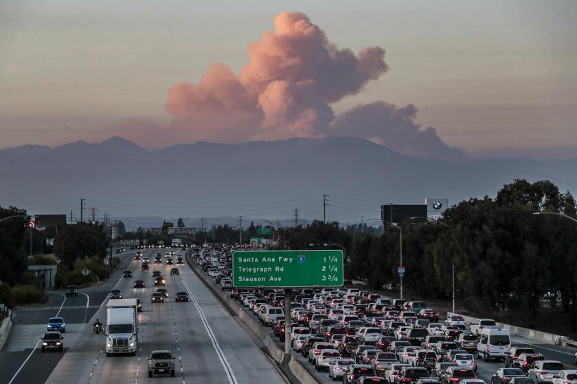 Norwalk, CA, Sunday, Sept. 20, 2020 - The Bobcat Fire, as seen from the 105/605 interchange, continues to burn, becoming one of the largest fires in LA County history. (Robert Gauthier/ Los Angeles Times)