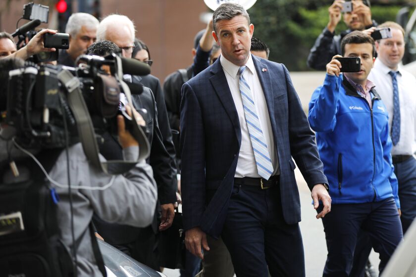 Rep. Duncan Hunter, R-Alpine leaves a federal court in San Diego after pleading guilty in a yearlong campaign finance investigation on Dec. 3, 2019.