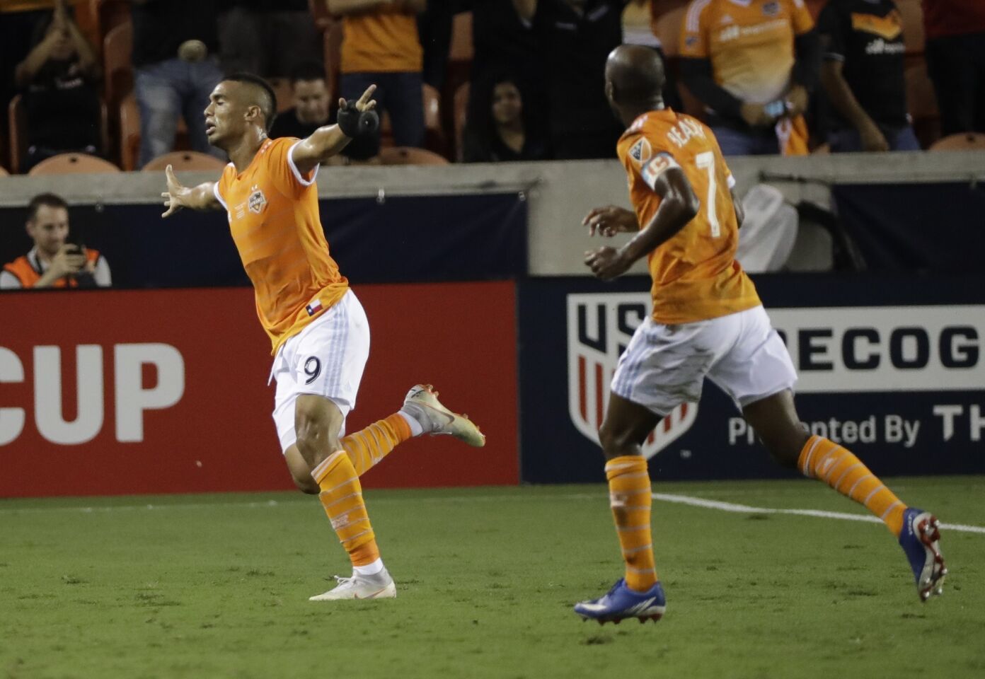 Houston Dynamo's Mauro Manotas celebrates his goal during the first half of the U.S. Open Cup championship soccer match against the Philadelphia Union Wednesday, Sept. 26, 2018, in Houston. (AP Photo/David J. Phillip)