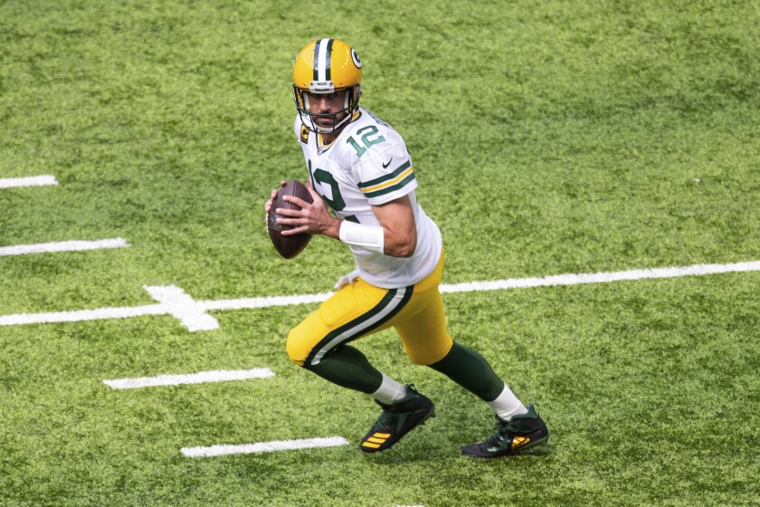 Green Bay Packers quarterback Aaron Rodgers looks to pass against the Minnesota Vikings on Sept. 13.