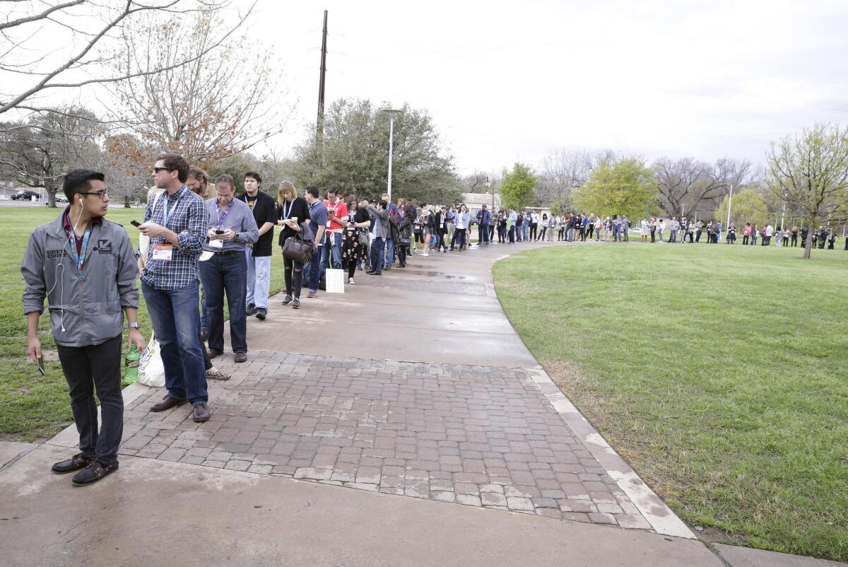 SXSW attendees wait in line for panel featuring President Obama.