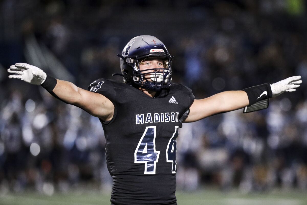 Madison outside linebacker Lawson Minshew (44) celebrates during a home victory over Granite Hills in September.