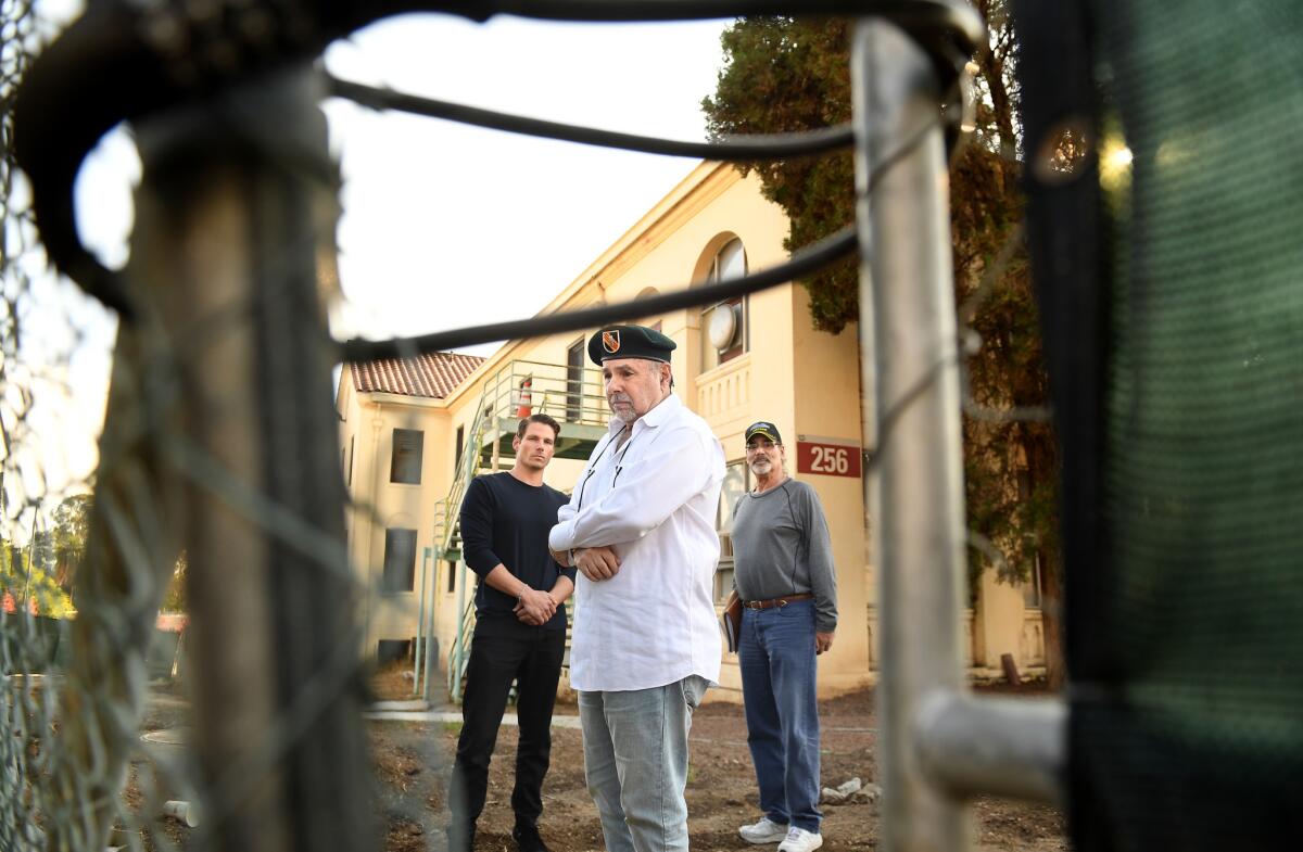 War veterans from left, Peter Erdos, Dov Simens and Steven Goldstein stand outside building 256 at the West Los Angeles Healthcare Center.