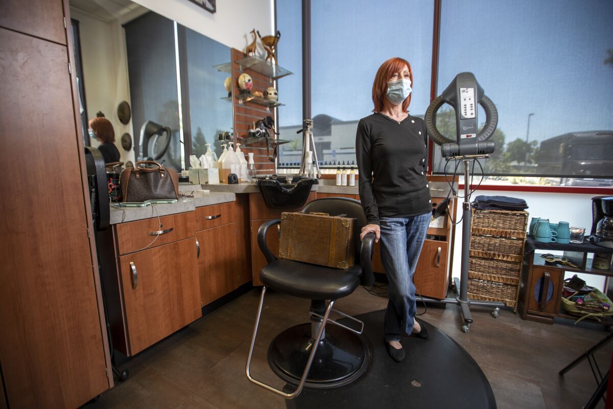 Dee Lescault, owner of MUTI Hair Design Studio in Sola Salon Suites