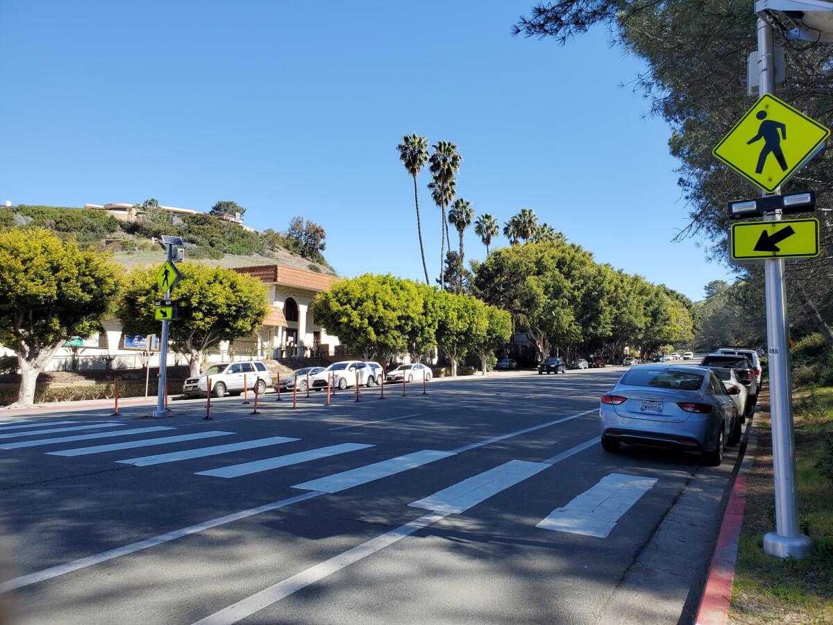 Pedestrian-activated crosswalk in the 2500 block of Torrey Pines Road