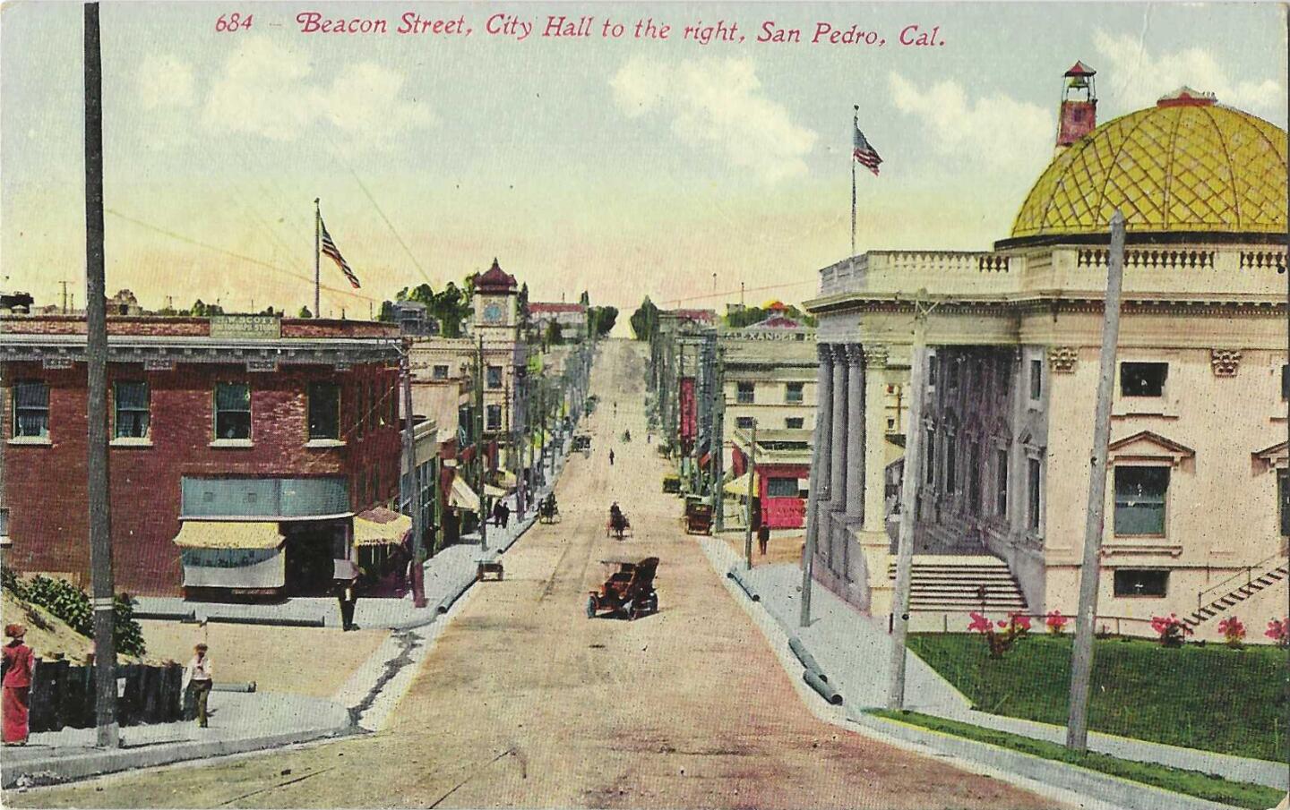 The San Pedro cityscape is depicted in a vintage postcard that reads "Beacon Street, City Hall to the right, San Pedro, Cal."